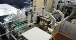One point- folding and gluing machine